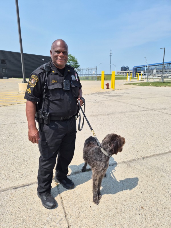 Victor the police officer and Elly at the airport